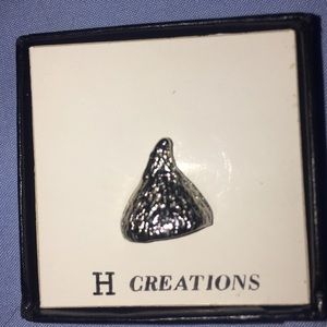 Silver tone Candy KISS Pin